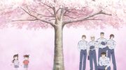 Elementary school-age Shinichi and Ran, with young Hiromitsu, Rei, Date, Kenji, and Matsuda