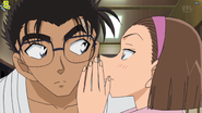 Sonoko whispering to Makoto.png